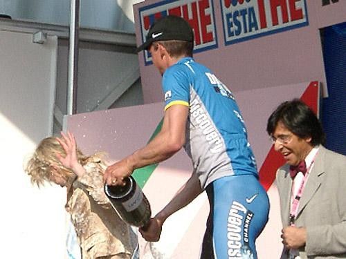 Time to spray the podium girls for Paolo Savoldelli