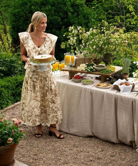 Shea McGee photographed in the garden hosting a summer feast
