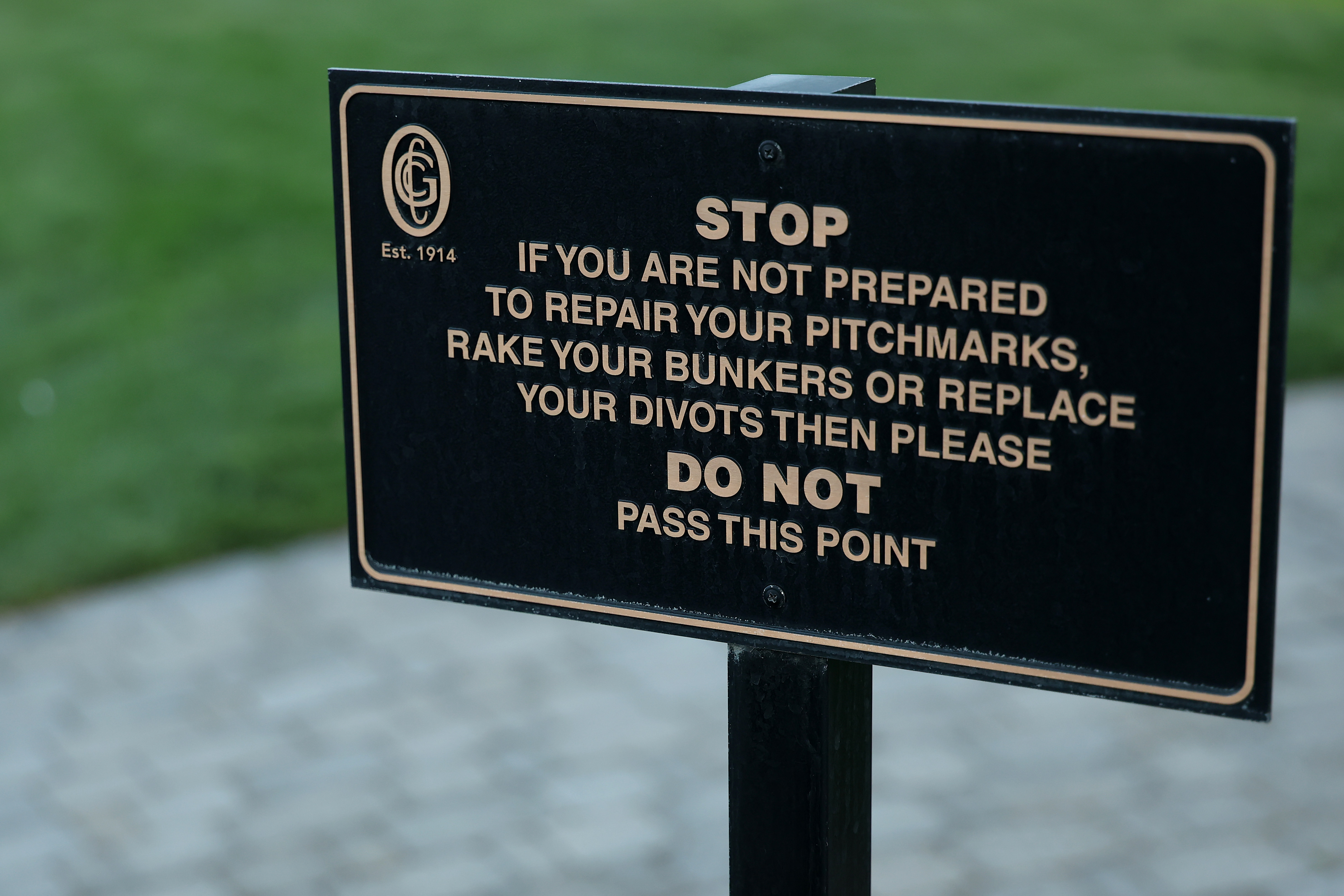A repair your pitch marks sign for golfers