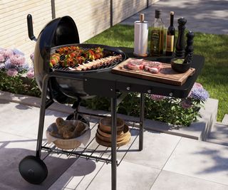 food cooking on a charcoal grill on a patio