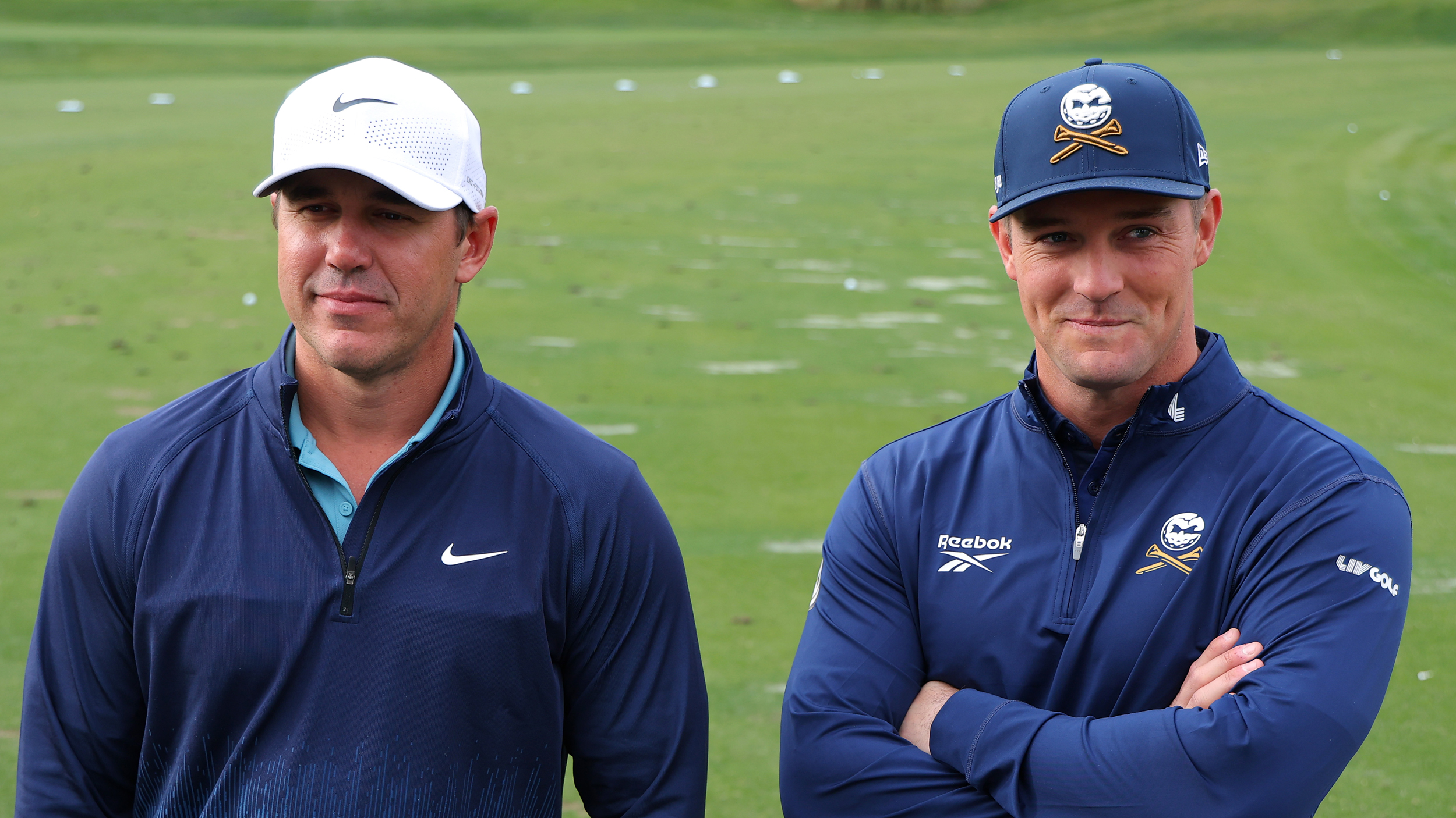 Brooks Koepka (left) and Bryson DeChambeau stand on the range ahead of The Showdown at Shadow Creek Golf Course in December 2024
