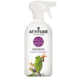 A white spray bottle with a green frog on the front of it