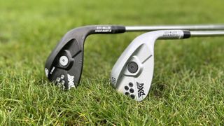 PXG Sugar Daddy II Wedges in black and chrome lying on grass