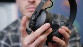 The headphones have two touch-sensitive buttons, one on each earcup.