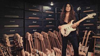 Yngwie Malmsteen surrounded by Statocasters and Marshall amps