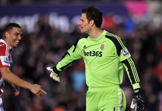 Stoke City goalkeeper Asmir Begovic celebrates after scoring against Southampton, 2013