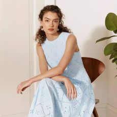 Woman wearing blue Hobbs dress