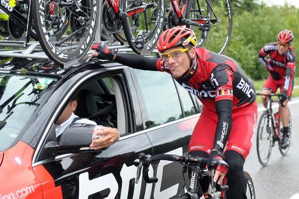 Philippe Gilbert gets some advice from the BMC team car