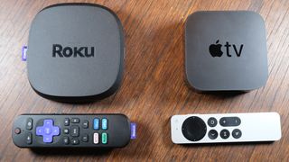 The Roku Ultra and Apple TV 4K, with their remotes