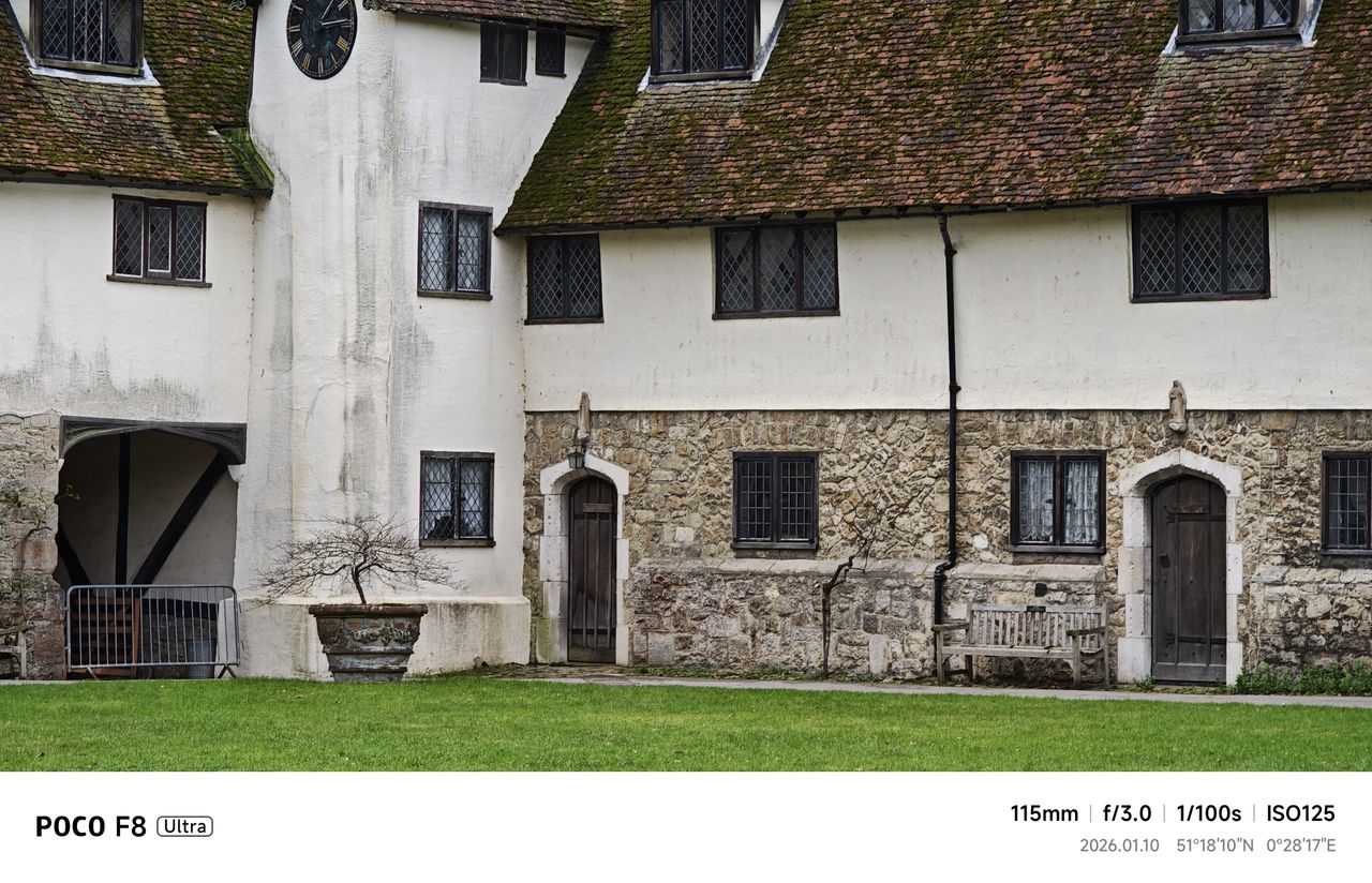 Close up of old abbey building with green
