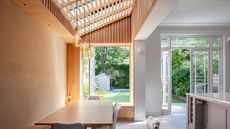 side return extension for kitchen diner with slatted timber louvres over glazed ceiling and picture window