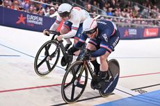 Jack Carlin (left) racing to second place in the 2022 European Track Sprint final behind France's Sébastien Vigier