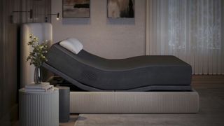 The eight sleep pod 4 mattress cover on a mattress that's on an adjustable bed frame