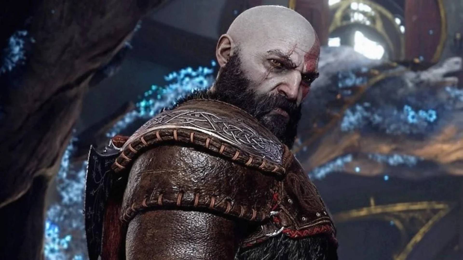 Beste PS4 -Spiele: Kratos dreht sich um die Kamera in God of War Ragnarok um die Kamera zu betrachten