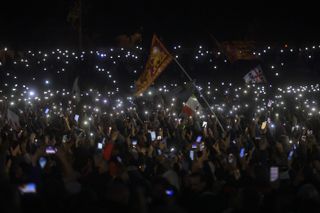 Protestors in Rome voice their opposition to the government’s green pass