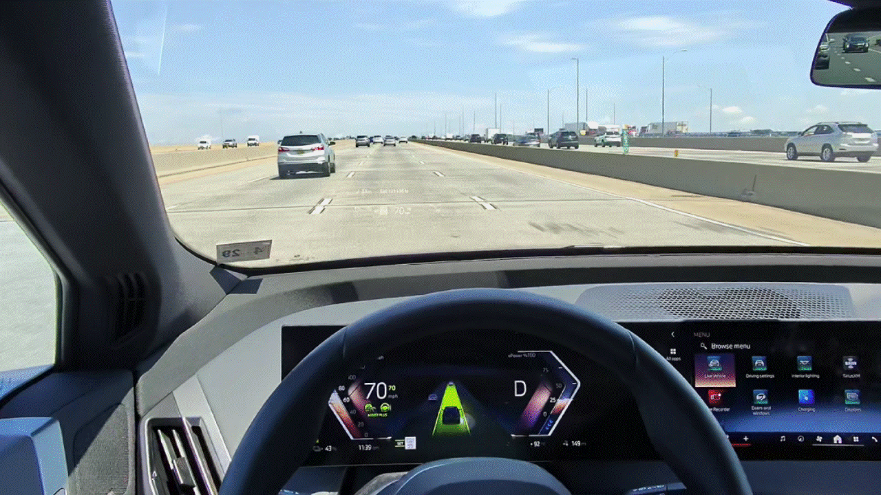 Gif animation showing 2026 BMW ix xDrive45 auto lane change assist.