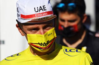 Tadej Pogacar masked up while leading the Tour de France in 2021