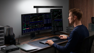 BenQ ScreenBar Max lighting up a dual-display setup