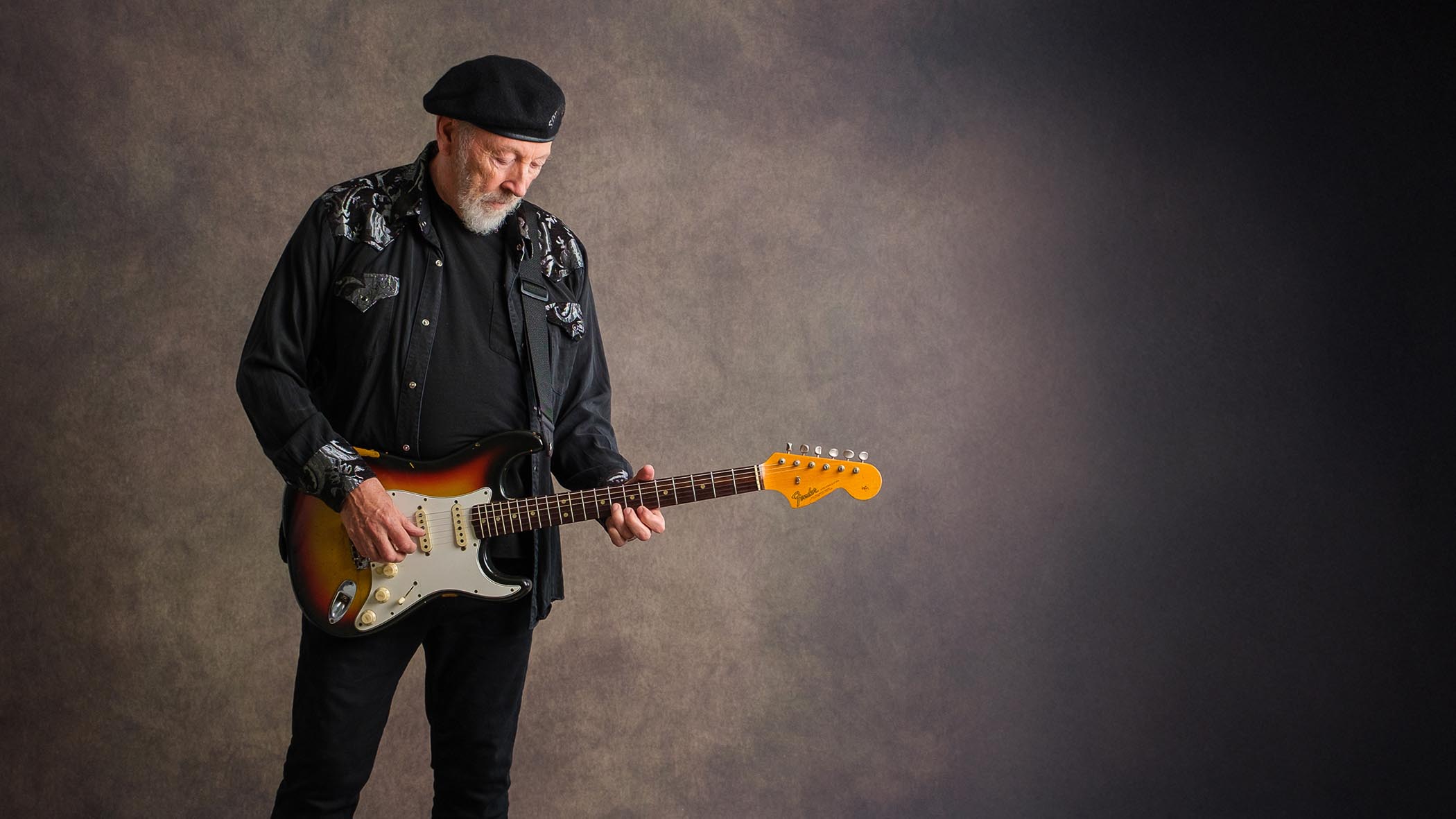 Folk icon Richard Thompson is pictured wearing his trademark hat, with his trademark Stratocaster.