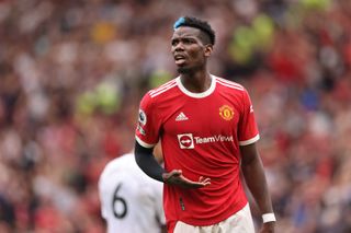 Paul Pogba in action for Manchester United against Aston Villa in 2021.