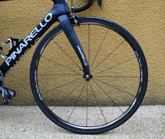 A Shimano Dura-Ace C24 wheel indicates this is a lightweight rig; on the back is an aero C50