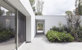 A central landscaped courtyard sits at the heart of the design