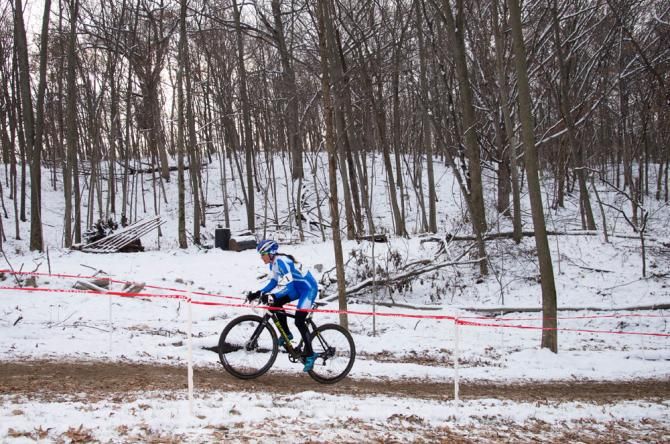 Nash rides alone through the snow covered forest