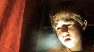 (L-R) Haley Joel Osment as Cole Sear and Bruce Willis as Malcolm Crowe in "The Sixth Sense"