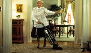 Mrs. Doubtfire Robin Williams dancing with a vacuum in full prosthetics