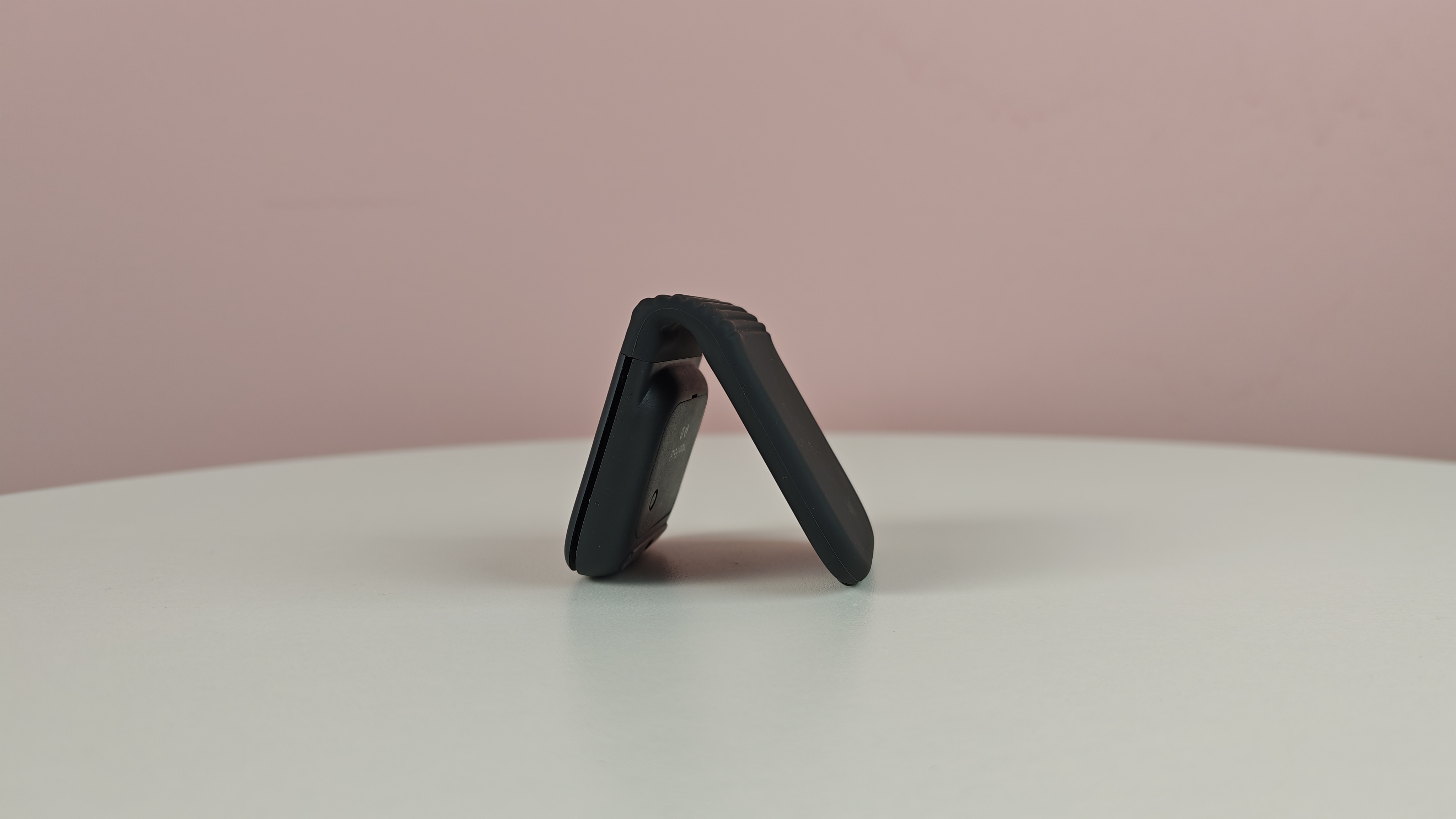 Logitech Mobi Fold half folded on table