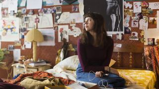 Bel Powley as Minnie sits on a bed in Diary of a Teenage Girl