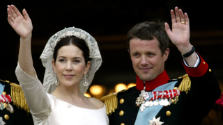 Crown Princess Mary and Crown Prince Frederik of Denmark wave from the balcony of Christian VII's Palace after their wedding on May 14, 2004 in Copenhagen, Denmark