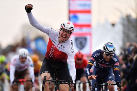 DENAIN FRANCE MARCH 17 Max Walscheid of Germany and Team Cofidis celebrates at finish line as race winner ahead of Dries De Bondt of Belgium and Team AlpecinFenix R during the 63rd Grand Prix De Denain Porte du Hainaut 2022 a 2003km one day race from Denain to Denain GPDenain on March 17 2022 in Denain France Photo by Luc ClaessenGetty Images