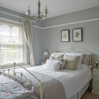 guest bedroom with chandelier