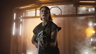 Rain Carradine (Cailee Spaeny) armed with a pulse rifle as seen in &quot;Alien: Romulus&quot;