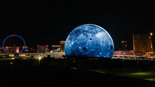 a giant spherical LED screen looks like the moon