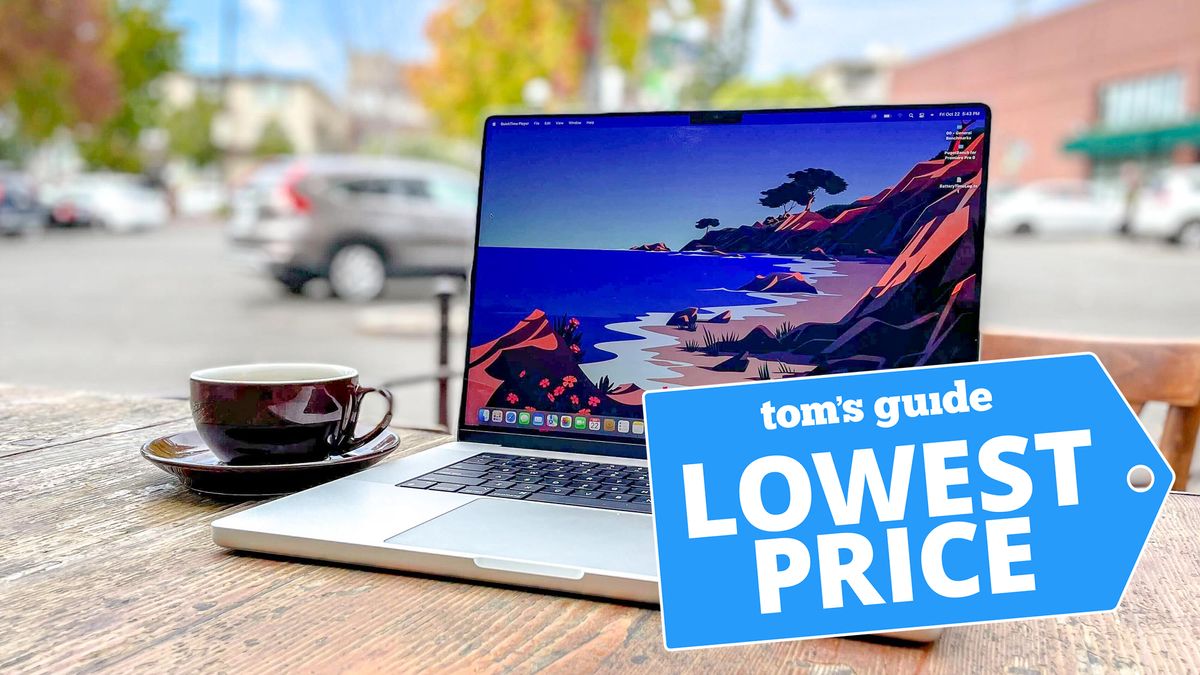 13-inch MacBook Pro M2 shown outdoors next to coffee cup