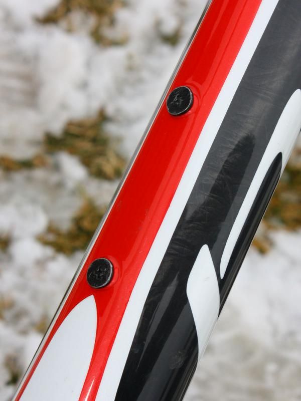 The unused bottle mounts are plugged with flat head screws that normally fill in the toe stud holes of Page's Specialized shoes.