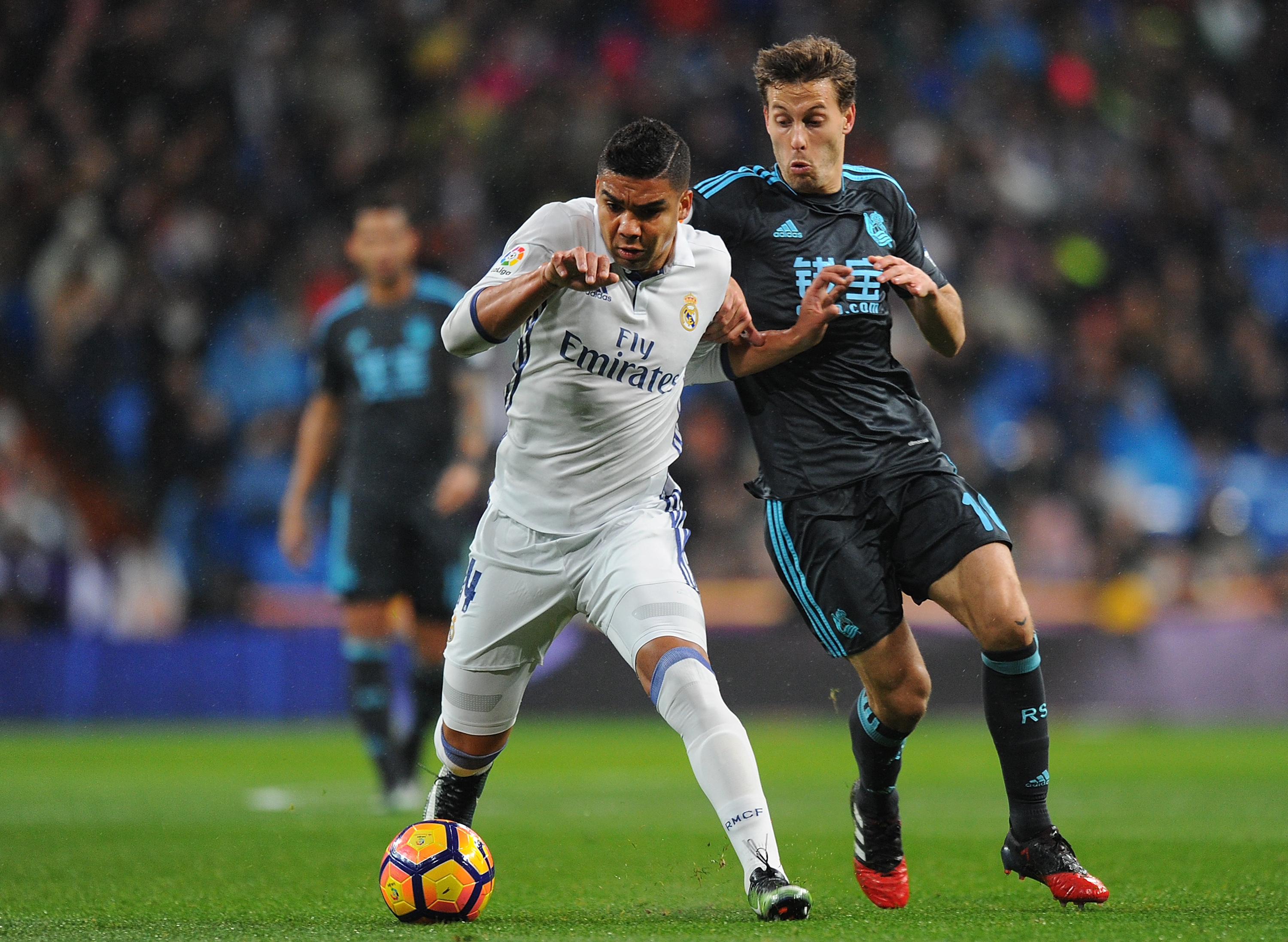 Real Madrid's Casemiro battles with Real Sociedad's Sergio Canales in a La Liga game in January 2017.