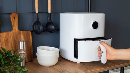 An air fryer on a kitchen counter