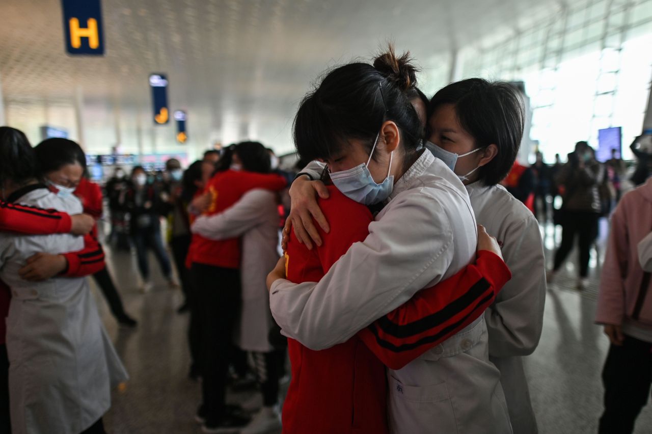 Medical staff hug