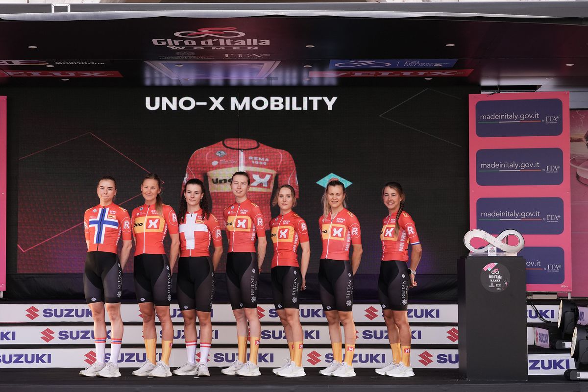 Uno-X Mobility on stage at the 2024 Giro d'Italia Women at the teams presentation at the Piazza della Loggia in Brescia