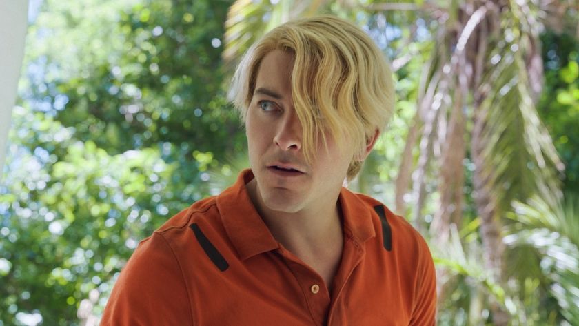 Taz Skylar playing Sanji in an orange shirt in One Piece Season 2