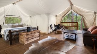 The spacious inside of a glamping tent at Under Canvas Mount Rushmore