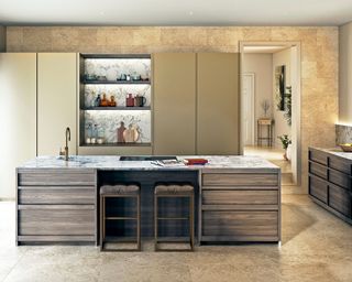 Modern kitchen with wood island and marble countertop