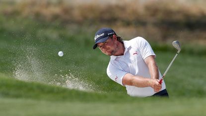 Eddie Pepperell hitting a bunker shot