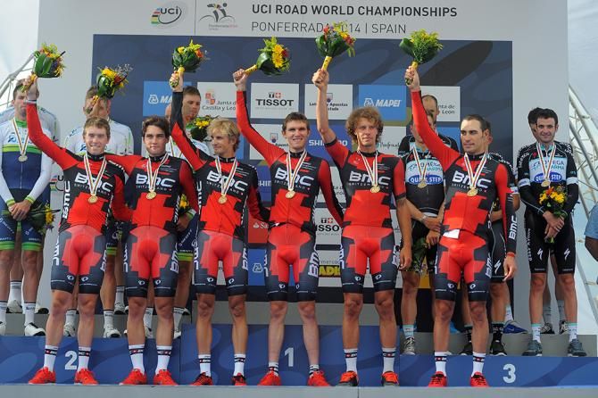 BMC raise their arms in celebration