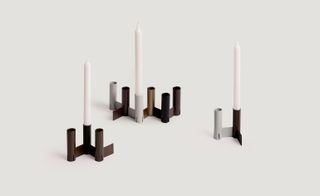 Sydney-based studio Page Thirty Three presented a new collection of lighting, furniture and accessories called Tactile Equations, which included this series of interlocking candle holders
