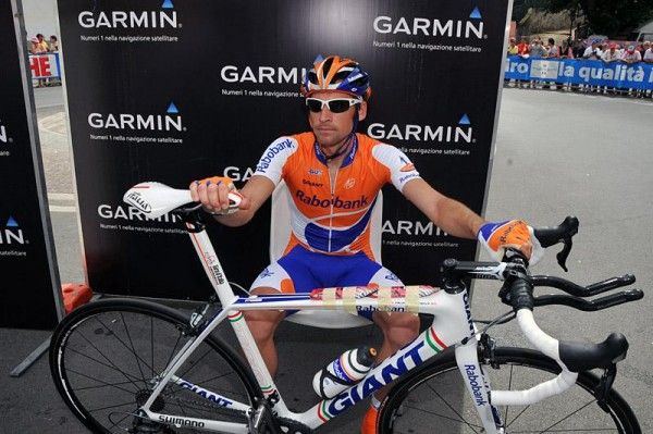 Denis Menchov waits his turn to enter the start house.