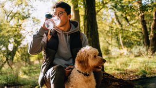 Man on a walk with his dog